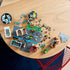 Pieces of the LEGO® City Downtown 60380 Building Toy Set (2,010 Pieces) during the building process