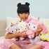 girl playing Gund Hello Kitty Unicorn My Melody 10 Inch Plush