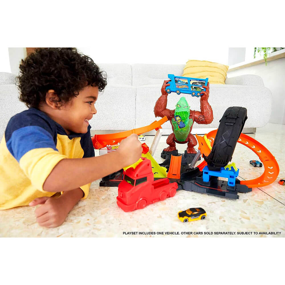 Child playing with the Hot Wheels City Toxic Gorilla Slam Set