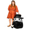 Woman standing next to the Massive Squishable Plague Doctor