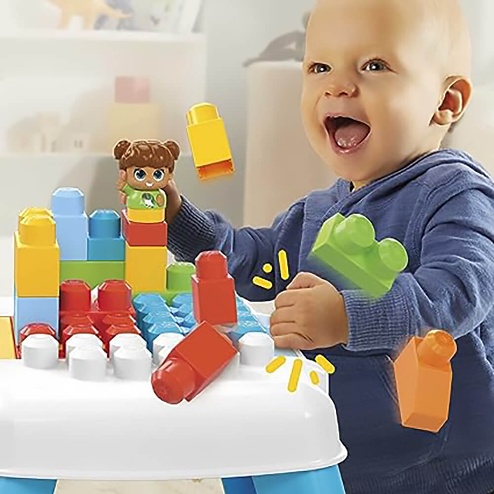 child playing with the MEGA BLOKS Build ‘n Tumble Table