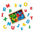 Melissa and Doug Wooden Letter Alphabet Magnets open package showing the size of the letters