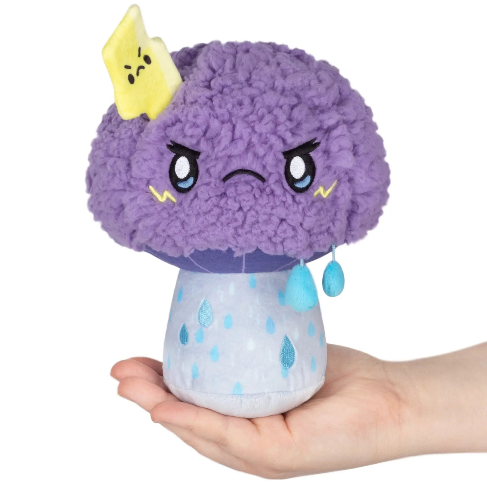 Squishable Alter Ego Mushroom Stormy Plush in someone's hand