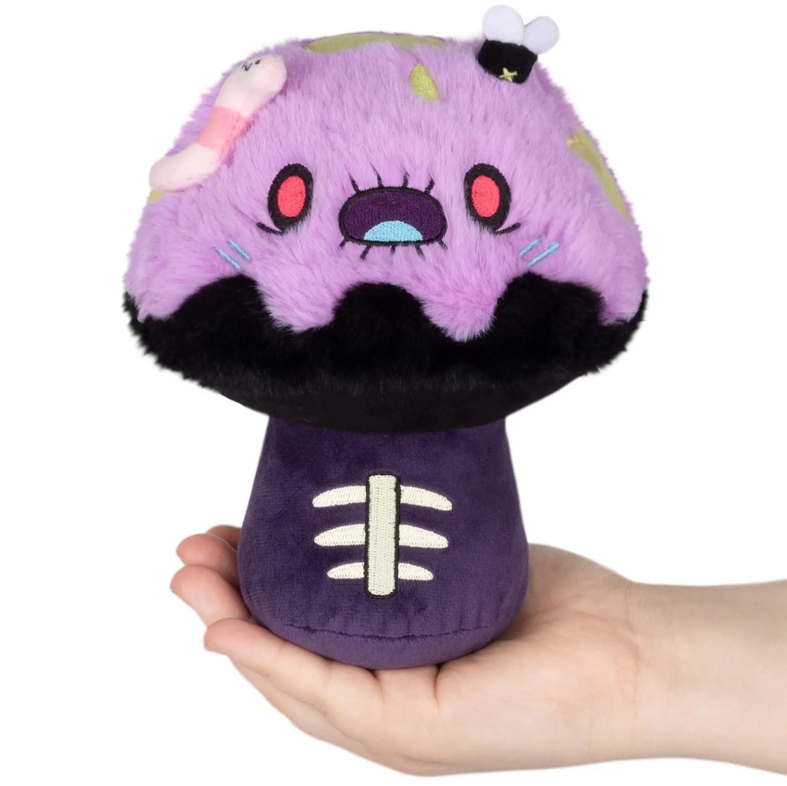 Squishable Alter Ego Mushroom Zombie Plush in someone's hand.