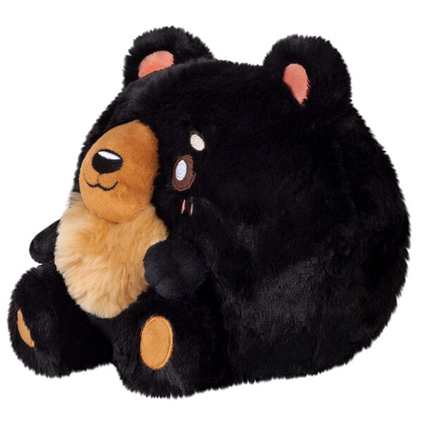 Side view of the Squishable Mini Black Bear Plush