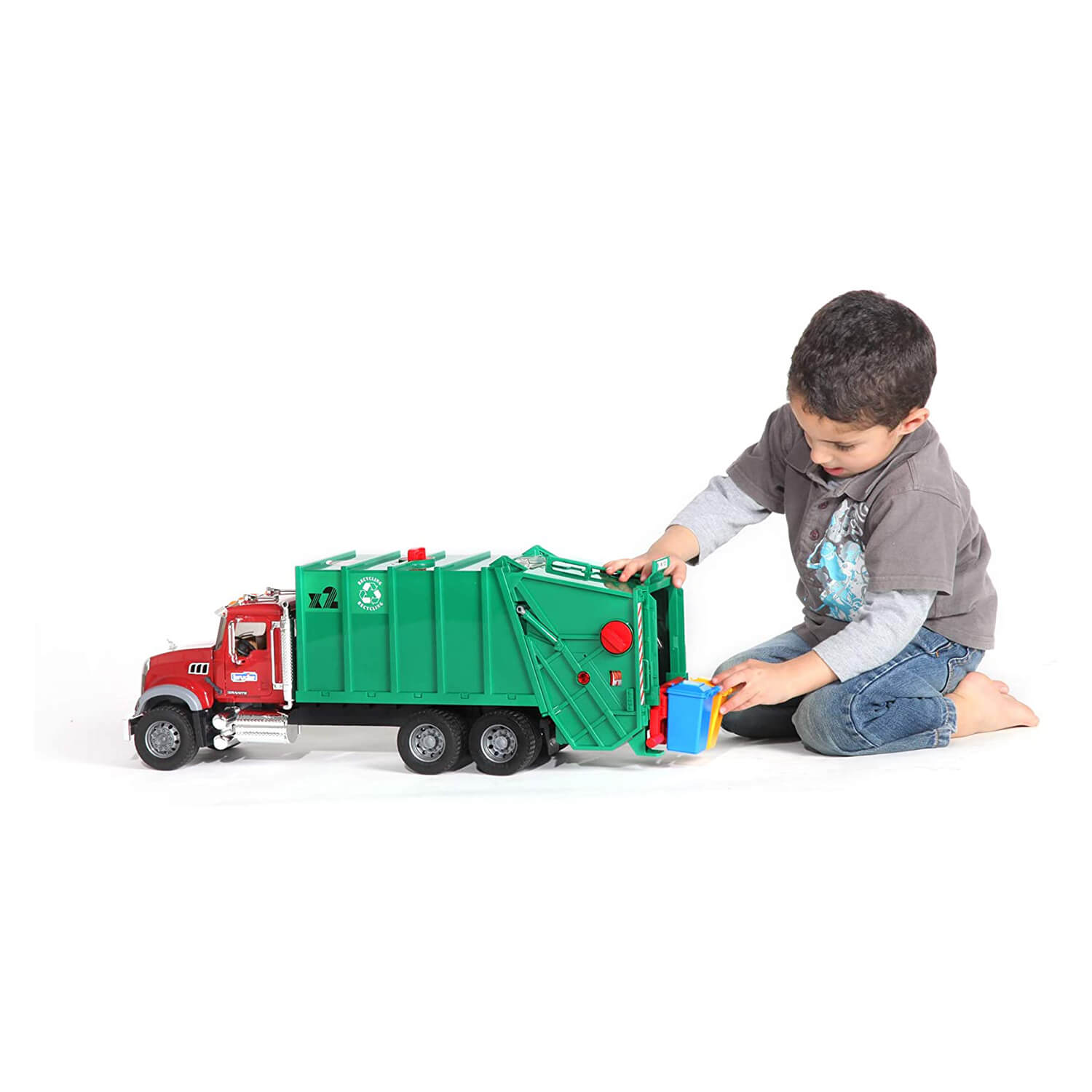 Kid playing with the garbage truck toy.