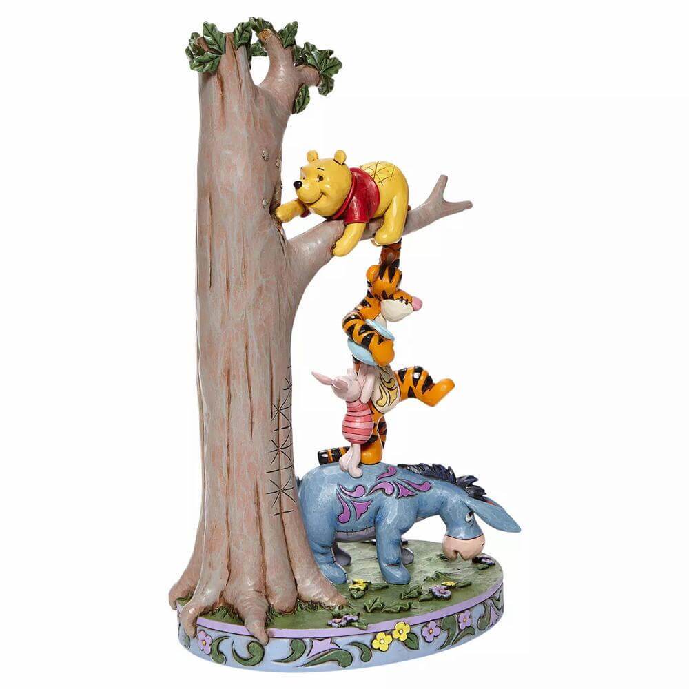 https://www.maziply.com/cdn/shop/products/enesco-disney-traditions-by-jim-shore-tree-with-pooh-and-friends-collectible-figurine-4_1024x.jpg?v=1680367569