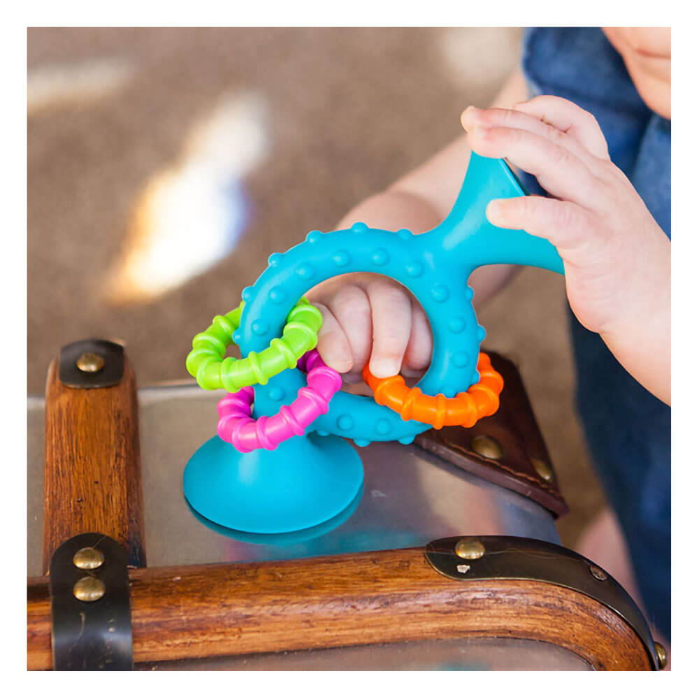 Kid playing with the toy.