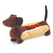 Folkmanis Hot Dog Finger Puppet front view. It shows the brown dachshund puppet in a removable bun, ketchup, and mustard.