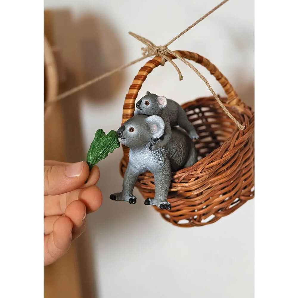 https://www.maziply.com/cdn/shop/products/schleich-wild-life-koala-mother-with-baby-lifestyle-2_1024x.jpg?v=1661261764